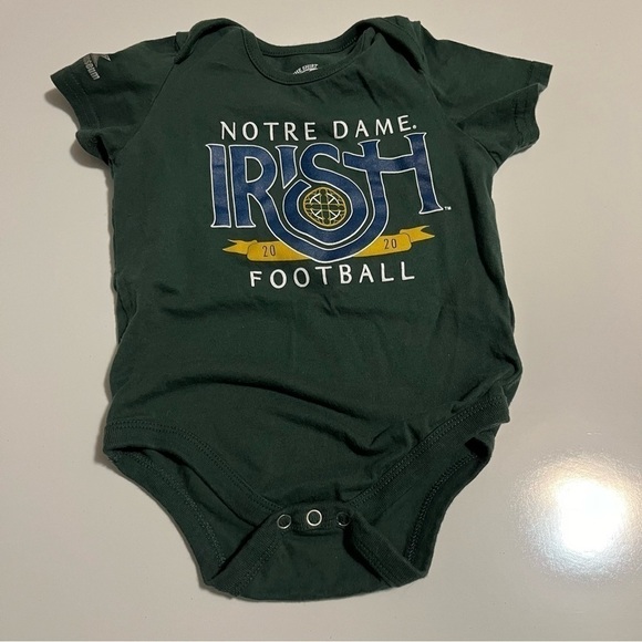 Infant Colosseum Green Notre Dame
Fighting Irish 2020 The Shirt Bodysuit. - Picture 2 of 5